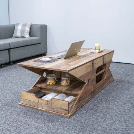 Lo más especial es dividir el mismo espacio en la planta superior e inferior. La mesa de centro cuenta con una plataforma doble de 57 cm de profundidad para colocar objetos. En el otro lado hay una plataforma de 28,5 cm de profundidad.